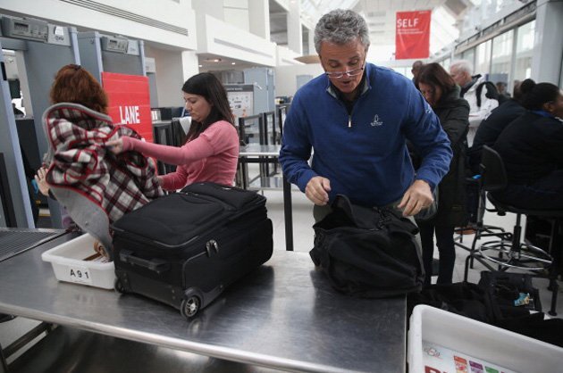 airport screening john moore getty images