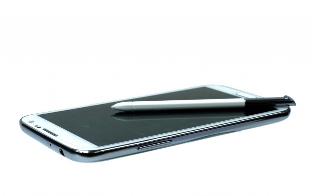 White mobile phone with stylus pen