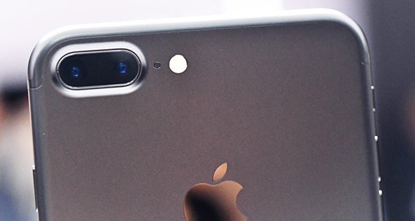 A closeup view of the iPhone 7 Plus' dual cameras during an Apple media event at Bill Graham Civic Auditorium in San Francisco, California on September 7, 2016. Apple on Wednesday unveiled two upgraded versions of its iPhone and a new waterproof smartwatch, seeking to reignite growth for the iconic technology maker. The iPhone 7 and larger iPhone 7 Plus, with new camera technology, 50-meter water resistance and other features, were the highlight of an Apple media event in San Francisco. / AFP / Josh Edelson (Photo credit should read JOSH EDELSON/AFP/Getty Images)