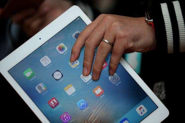 An attendee looks at the new 97 iPad Pro 1